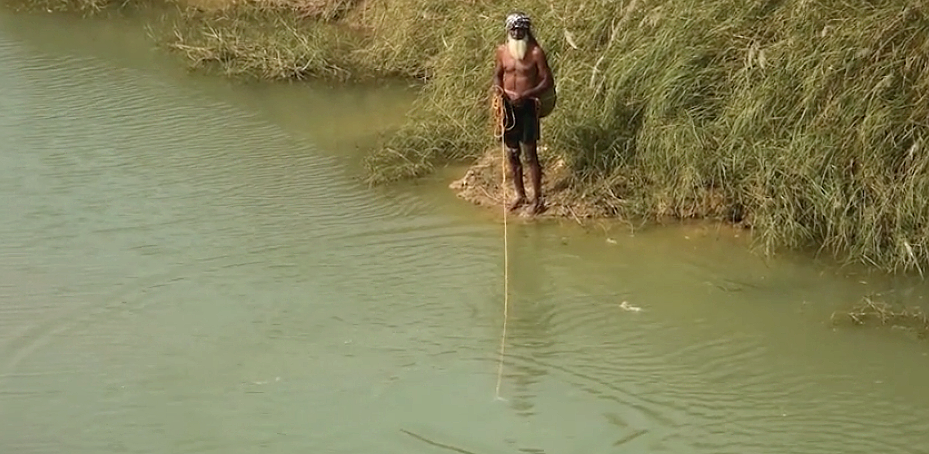 Muddy Footsteps Along River Kopai — still